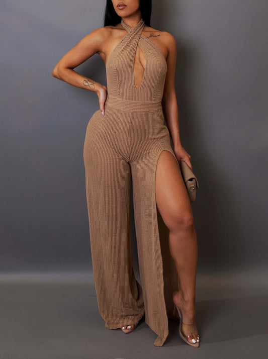 Stylish beige jumpsuit with side slit and halter neck, perfect for glamorous occasions and effortless chic outfits.